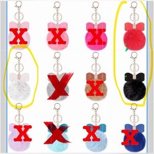 Pom Pom Keychain bag charm. 3 left. Black, Lt and Red Available.